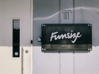 Front door of building with Funsize signage on it