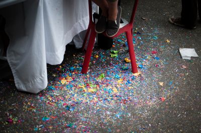 Multi-colored confetti on the ground