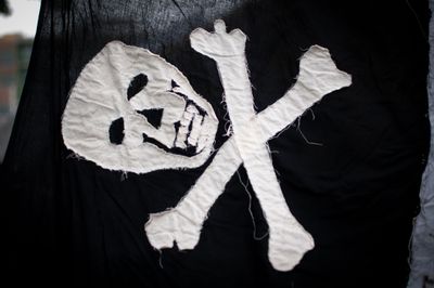 Hand-sewn flag depicting skull and crossbones